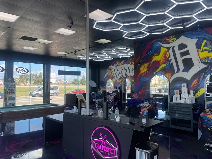 Team Perfect front desk and barber stations